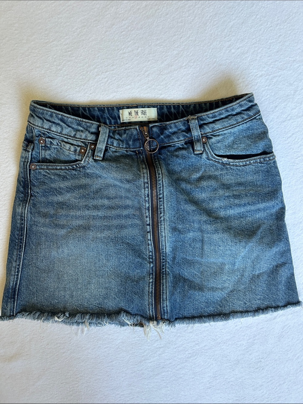 We The Free Distressed Blue Denim Zip-Front Mini Skirt